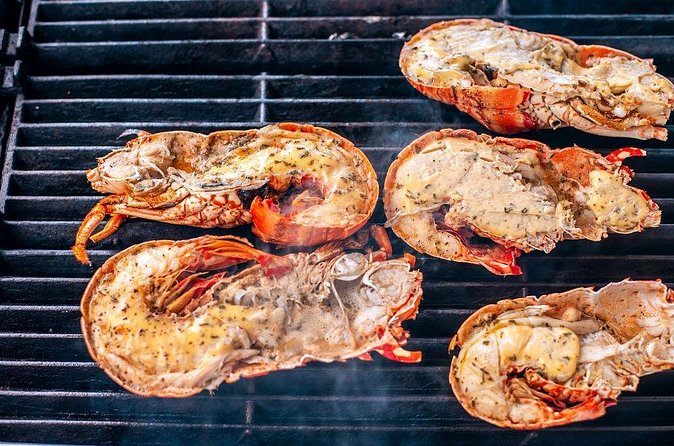 Antigua Seafood Lunch Cruise From St. John's - Lunch on the catamaran: lobster, shrimp, or fish